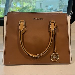 Tan and white Michael Korz bag